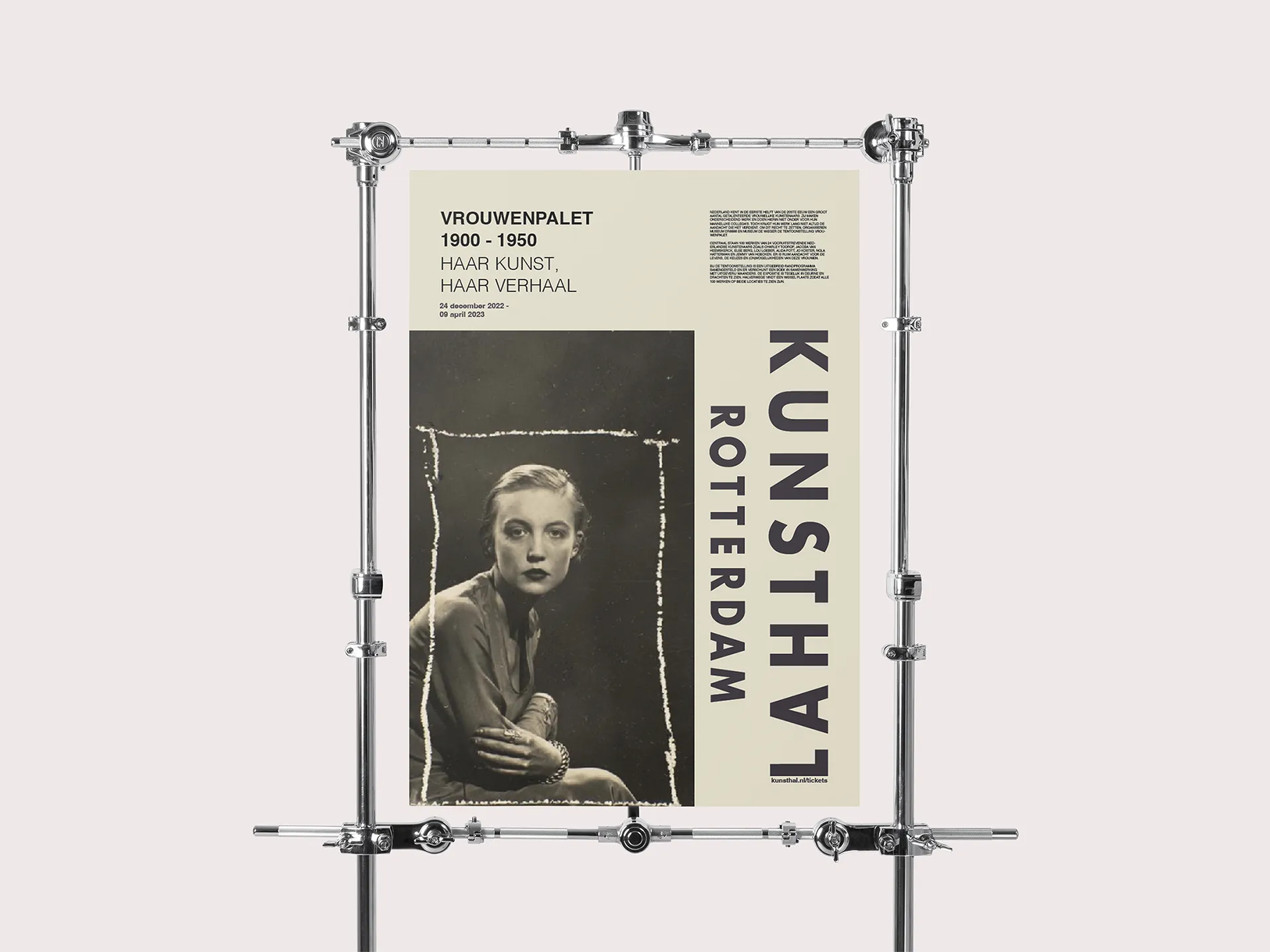 Vrouwenpalet 1900–1950 exhibition poster, version 2 — full-figure vintage portrait on cream with bold vertical 'KUNSTHAL ROTTERDAM' lettering, displayed on a metal frame