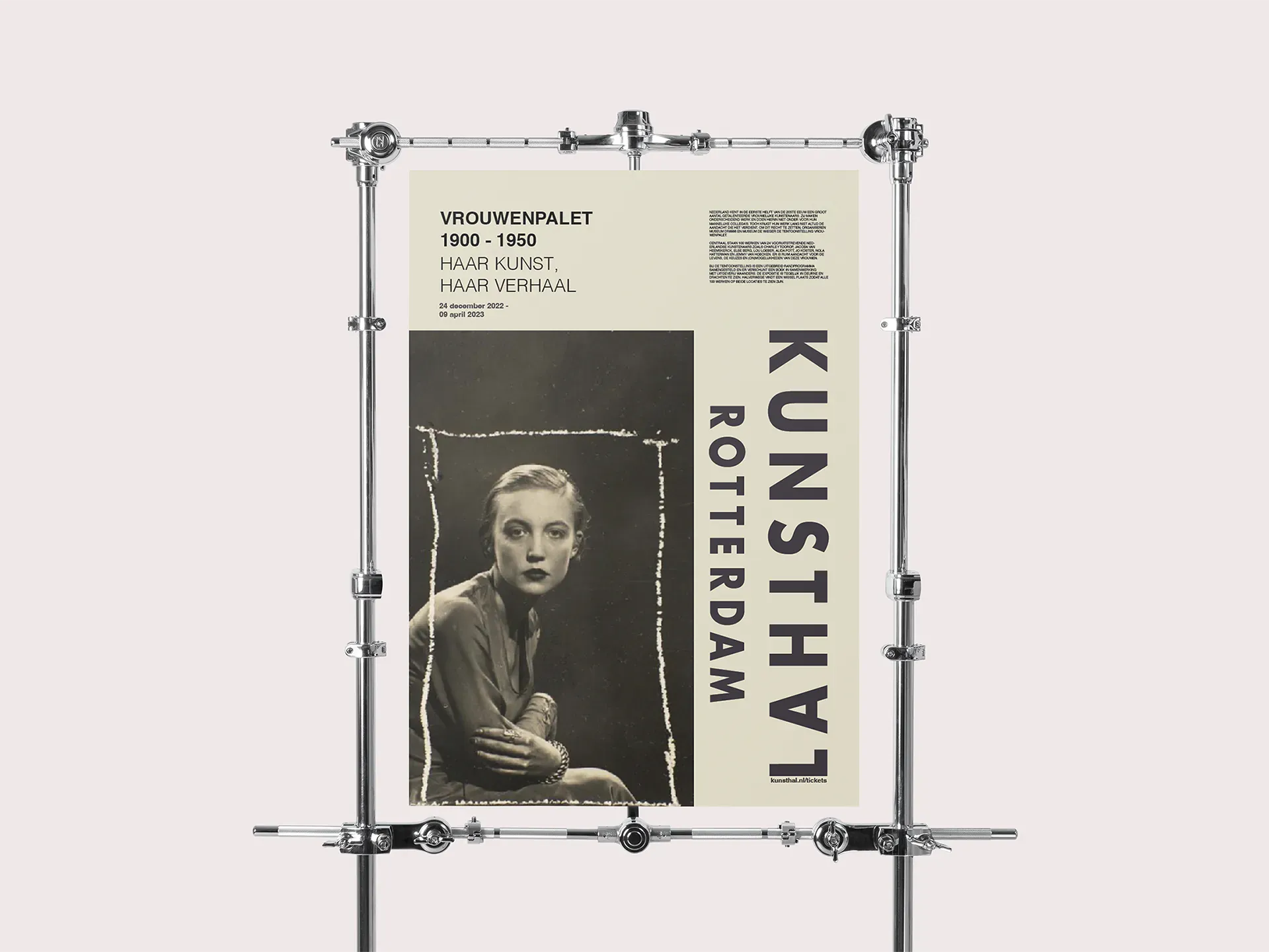 Vrouwenpalet 1900–1950 exhibition poster, version 2 — full-figure vintage portrait on cream with bold vertical 'KUNSTHAL ROTTERDAM' lettering, displayed on a metal frame